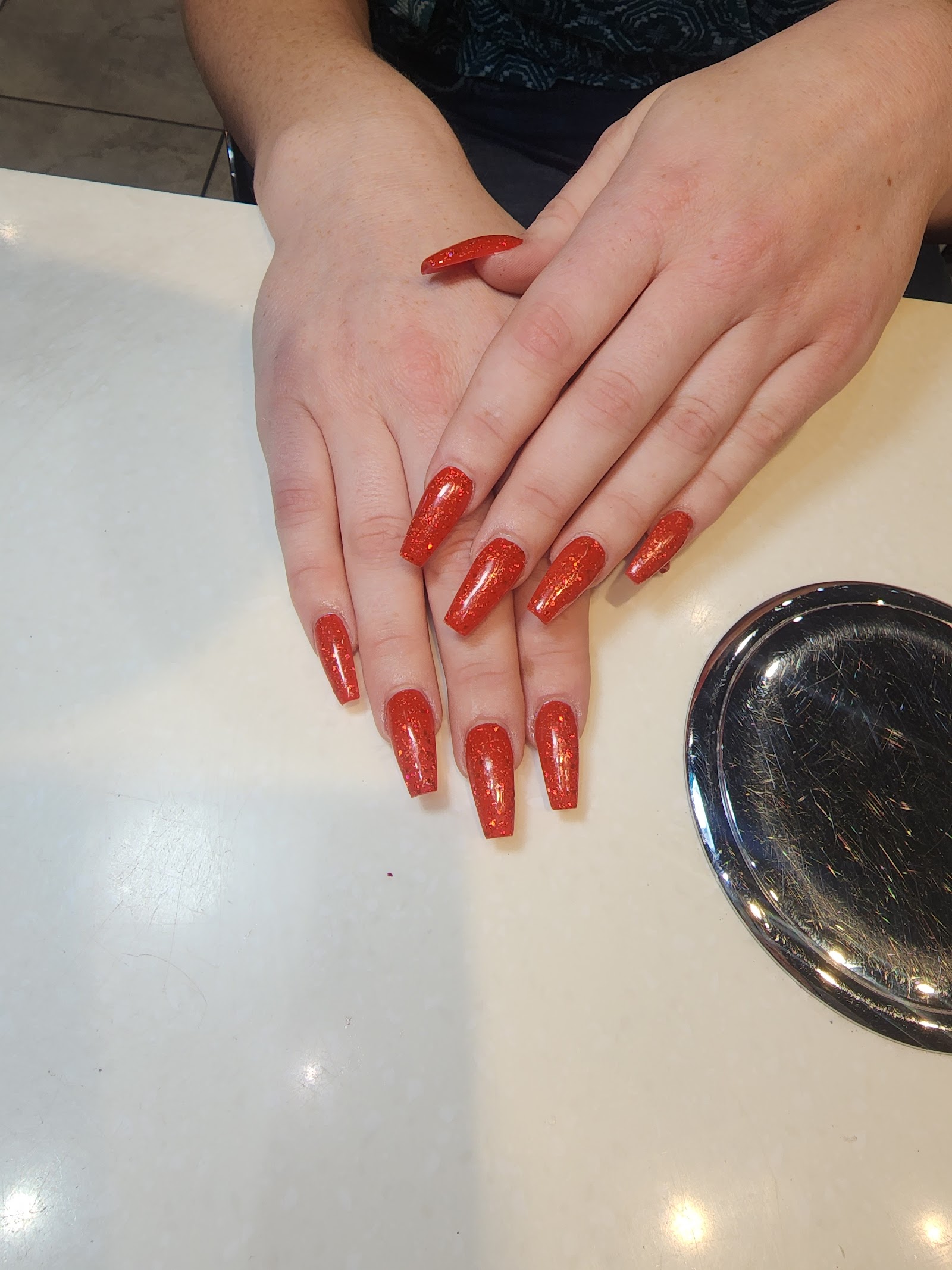 Oasis Nails & Spa logo